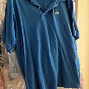 Preowned Blue Lacoste polo shirt-size 8.